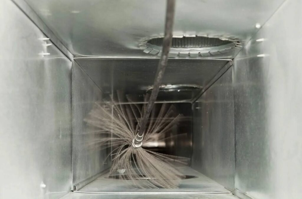 Air duct cleaning with a rotary brush to improve indoor air circulation in New Jersey by Atom Cleaning