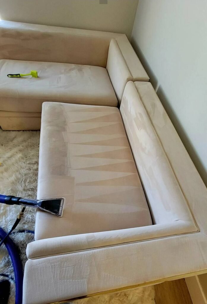 Deep upholstery cleaning of a sofa removing dust and dirt in New Jersey by Atom Cleaning
